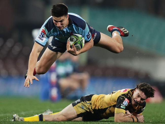 Waratahs fullback Jack Maddocks flies at the SCG. Picture: Mark Metcalfe/Getty