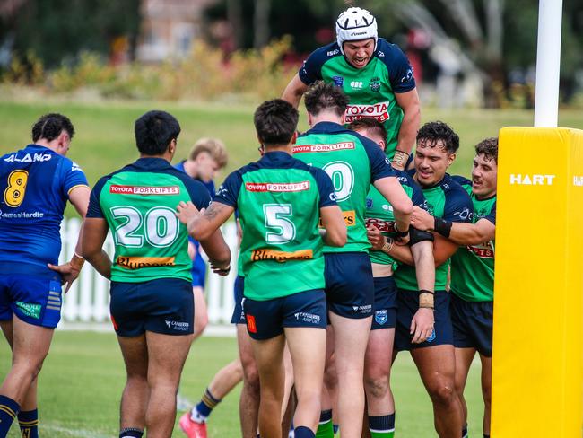 Canberra celebrates a try. Picture Warren Gannon Photography