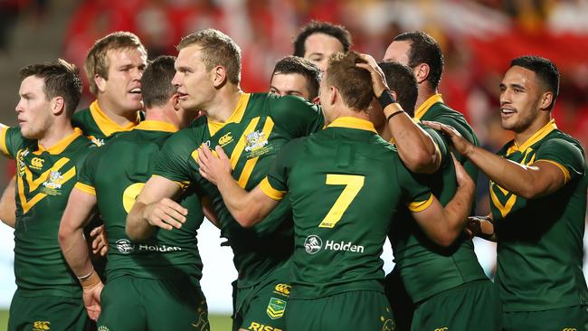 Tom Trbojevic celebrates a try with his Kangaroos teammates. Picture: AAP