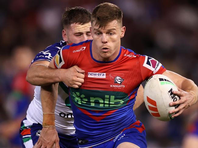 NEWCASTLE, AUSTRALIA - APRIL 09: Jayden Brailey of the Knights is tackled during the round six NRL match between Newcastle Knights and New Zealand Warriors at McDonald Jones Stadium on April 09, 2023 in Newcastle, Australia. (Photo by Cameron Spencer/Getty Images)