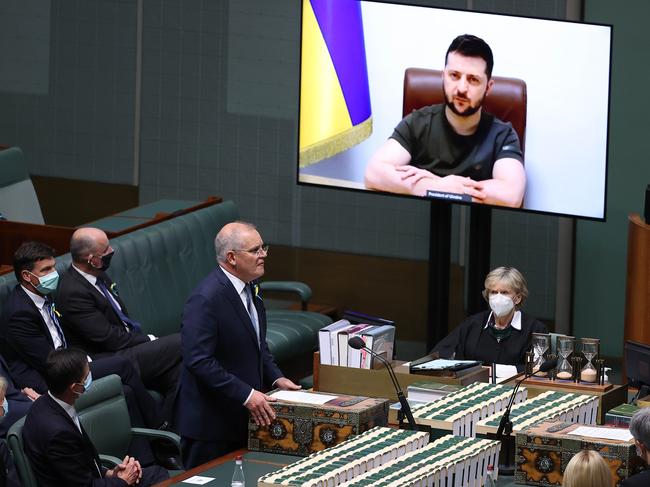 CANBERRA, AUSTRALIANewsWire Photos MARCH 31, 2022: Prime Minister Scott Morrison spoke to Volodymyr Zelensky, President of Ukraine,  before he addressed the Australian Parliament via a video link, on a large screen on the floor of the House of Representatives chamber.Picture: NCA NewsWire / Gary Ramage