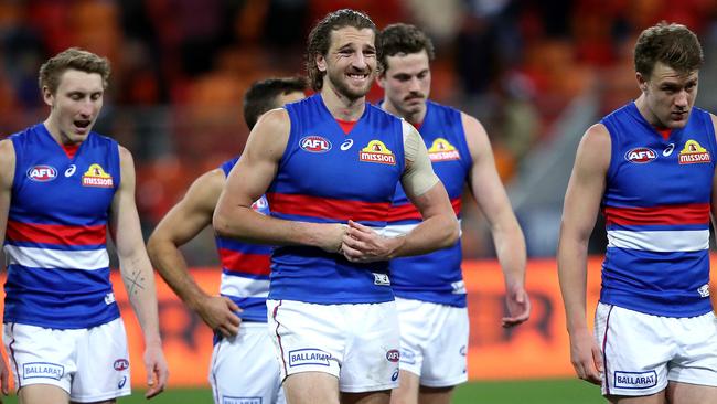 Bulldogs players leave the field after the AFL elimination match between the GWS Giants and Western Bulldogs at Giants Stadium. Picture. Phil Hillyard