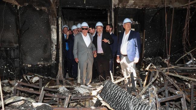 Mr Murdoch is shown inside the gutted synagogue. Picture: David Caird