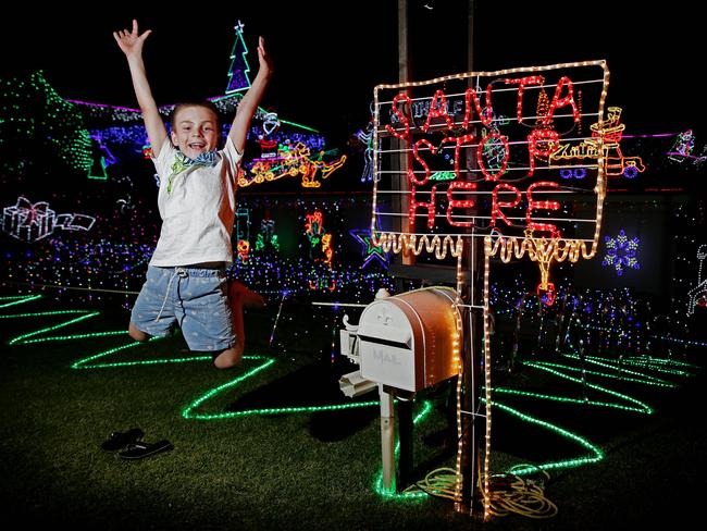 Tyler Draganov, then 7, with the Lights outside his home at 76 Warbler Street, Erskine Park in 2015. Picture: Justin Sanson