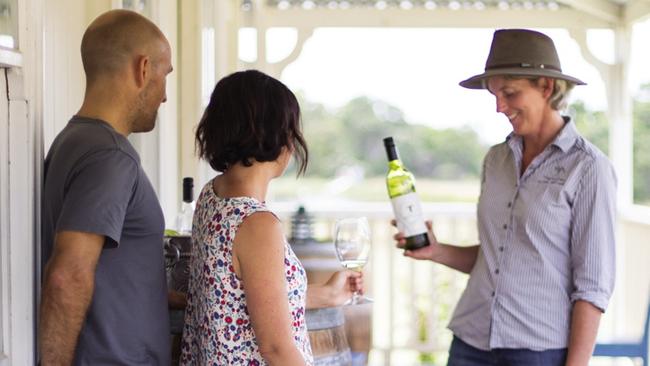 Twisted Gum will reopen Saturday May 29 (Pictured: co-owner Michelle Coelli doing a wine tasting).