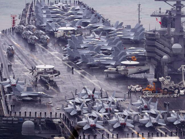 The US Navy's aircraft carrier USS Ronald Reagan (CVN-76) after finishing a joint naval exercise with South Korean forces. The US military says it is ready to fight North Korea. Picture: AFP