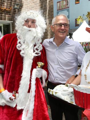 The PM gets into the spirit of the season. Picture: James Croucher