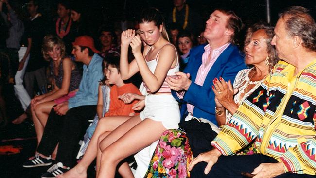 Ivanka pictured sitting on Donald Trump's lap during a concert by the Beach Boys at the Mar-a-Lago estate in 1996. Picture: Davidoff Studios/Getty Images