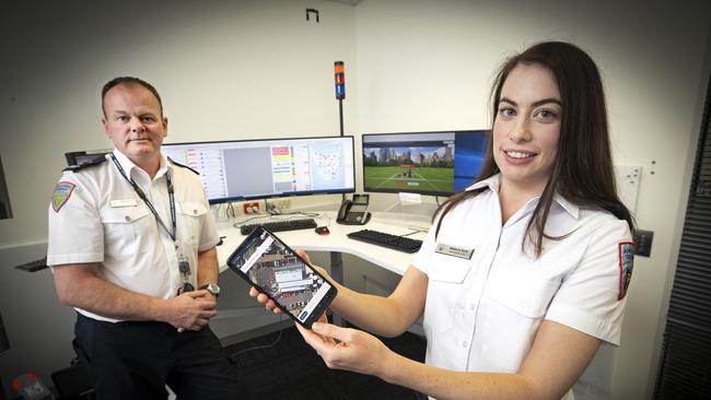 Ambulance Tasmania Subject Matter Expert Nick Bradford and Emergency Medical Dispatch Support Officer Rebecca Scott. Picture Chris Kidd