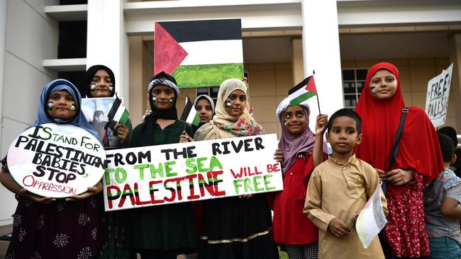 Zainab Khan, Zunairah Khan, Mariam Khan, Hurul Manzah, Sidrah Khan, Ayesha Fatima and Safa Khan at a pro-Palestine protest outside of the NT Parliament house on Friday October 27.