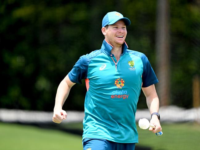 BRISBANE, AUSTRALIA - DECEMBER 20: Steve Smith celebrates as he has some banter with team mate Marnus Labuschagne after taking his wicket during an Australian Test squad training session at Allan Border Field on December 20, 2022 in Brisbane, Australia. (Photo by Bradley Kanaris/Getty Images)