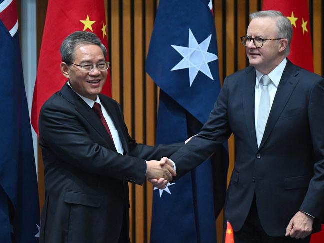 Australia's Prime Minister Anthony Albanese shakes hands with China's Premier Li Qiang during a signing ceremony at Parliament House in Canberra on June 17, 2024. Picture: AFP