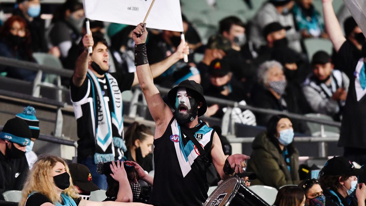 The Port cheer squad drummer rallies the troops at Adelaide Oval. Picture: Getty Images