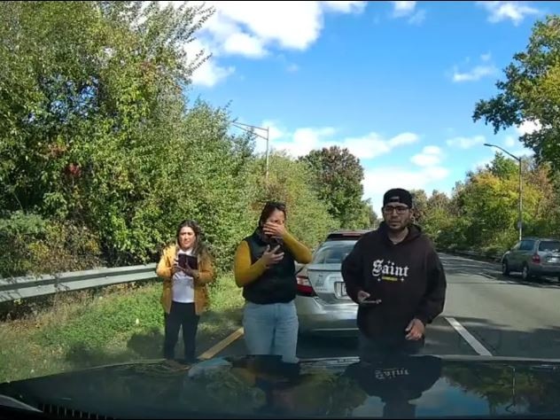 A car pulled in front of her, slammed on its brakes and then reversed into her front bumper. The group’s demeanour changed when they spotted her dashcam. Picture: TikTok