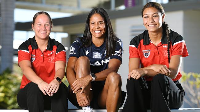 Kirwan State High school rugby league players Vanessa Scarborough (left) 18 and Ana Malupo (right) 18 with Parramatta Eels NRLW player Kimberley Hunt (middle). Picture: Shae Beplate.