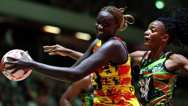 LONDON, ENGLAND - FEBRUARY 09: Mary Nuba Cholhok of Uganda beats Malawi's Tendai Masamba to the ball during Vitality Netball Nations Cup Third Place Play-off match between Malawi and Uganda at Copper Box Arena on February 09, 2025 in London, England. (Photo by Charlie Crowhurst/Getty Images for England Netball)