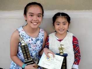 TALENTED DUO: Kathleen and Megan Nguyen at the eisteddfod on Wednesday. Picture: Jann Houley