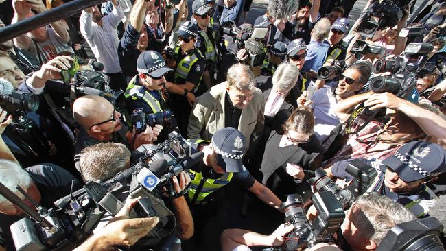 Cardinal George Pell arrives at the County Court for a plea hearing on Wednesday. Picture: David Caird.