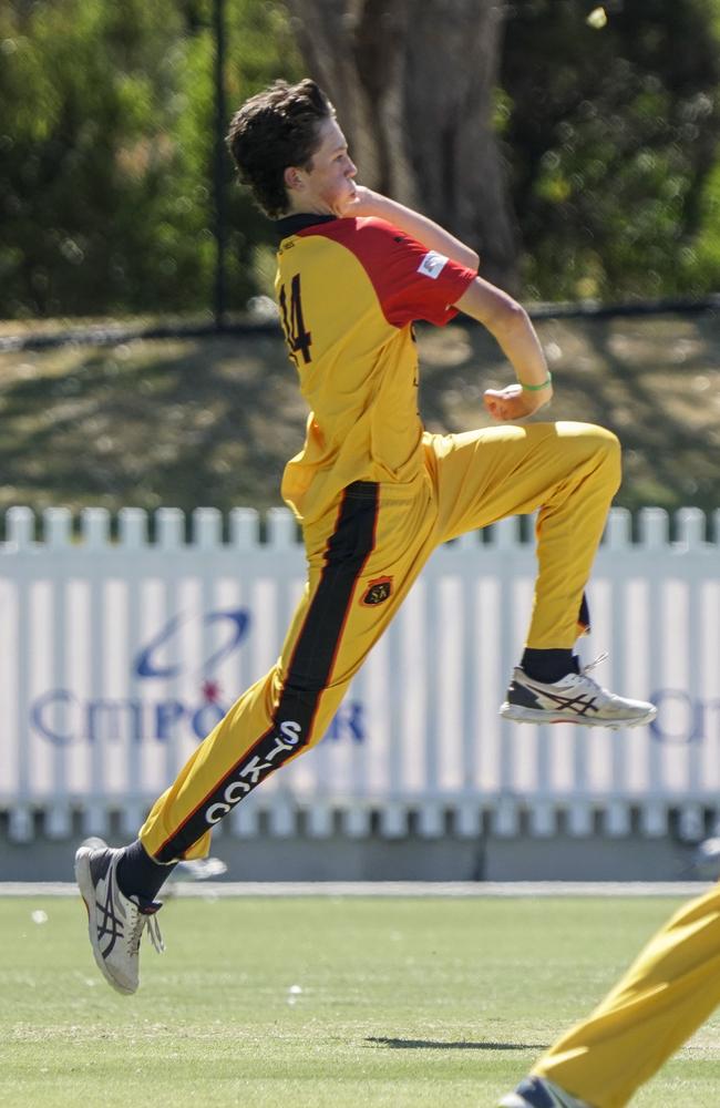 Harry Jones climbs into his work at the bowling crease. Picture: Valeriu Campan