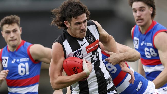 MELBOURNE, AUSTRALIA - MAY 14: Reef McInnes of the Magpies competes for the ball during the round eight VFL match between the Collingwood Magpies and the Footscray Bulldogs at AIA Centre on May 14, 2022 in Melbourne, Australia. (Photo by Martin Keep/Getty Images)