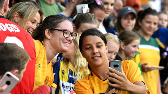 Sam Kerr gets a selfie with a fan at GMHBA stadium on November 26, 2017. Picture: AAP Image/Joe Castro.