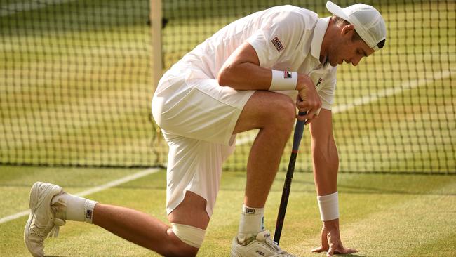 John Isner thumped down 53 aces. No wonder he’s exhausted.