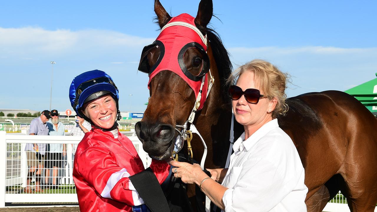 Leah Kilner alongside her mother after riding Swanston, trained by her father Greg to victory at Doomben. Picture: Grant Peters, Trackside Photography,