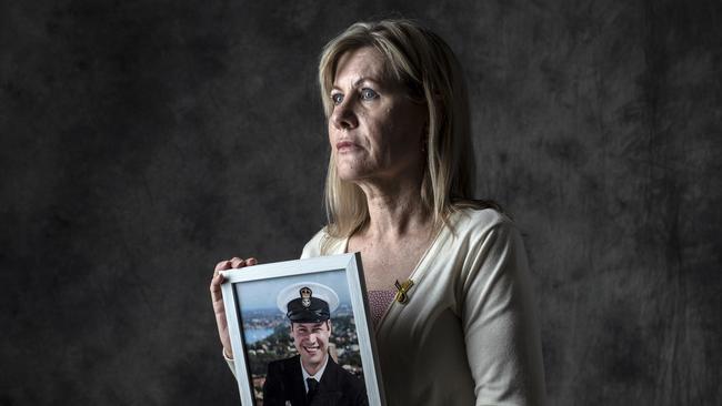 Julie-Ann Finney with a portrait of her son David, who took his own life after struggling with the stress and trauma of his military career.