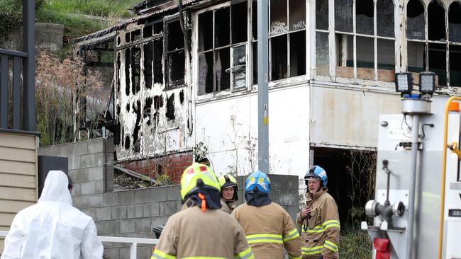 Emergency services on the scene of a house fire at Quayle Street, Sandy Bay. Picture: ZAK SIMMONDS