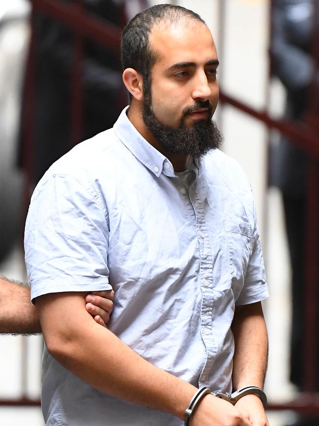 Hamza Abbas arrived at the Supreme Court of Victoria in handcuffs. Picture: James Ross/AAP.