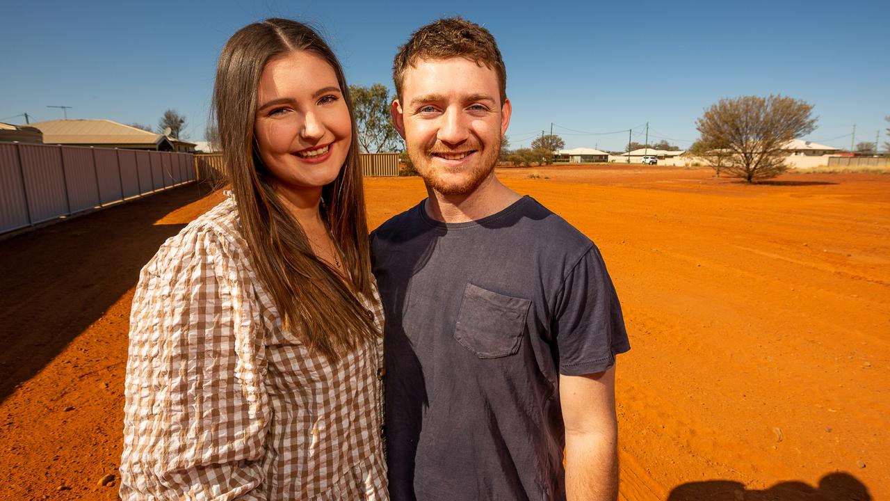 Tom Hennessy and Tessa McDougall at the block of land they have purchased in Quilpie as part of the council’s home owner grant. Photo – Leon O'Neil