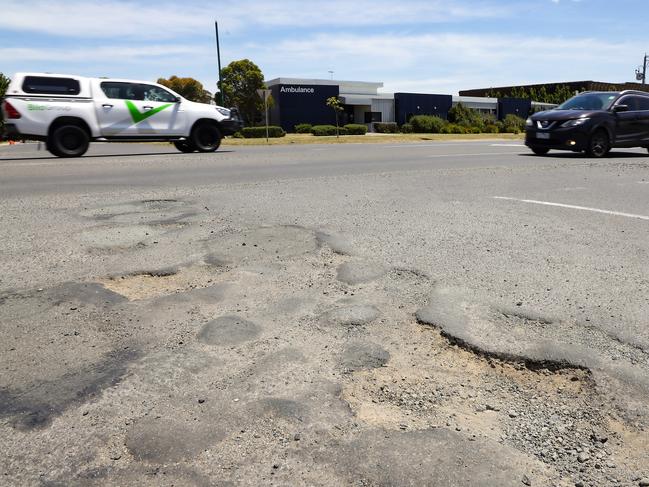 Potholes on the corner of Northern Highway and Duke Street in Wallan. Picture: Ian Currie