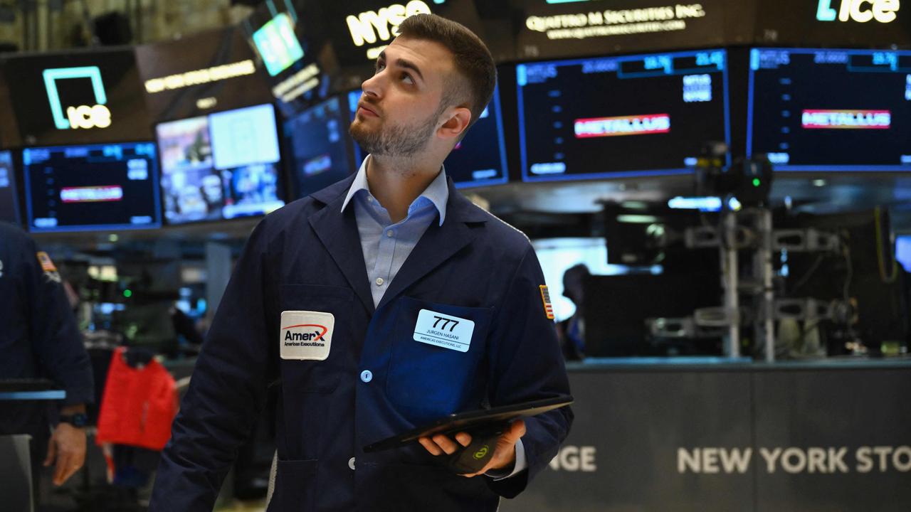 A trader works on the floor of the New York Stock Exchange (NYSE) during morning trading on March 4, 2024 in New York City. Wall Street stocks dipped in early trading Monday at the start of a heavy week of economic news that includes congressional testimony from Federal Reserve Chair Jerome Powell. (Photo by ANGELA WEISS / AFP)