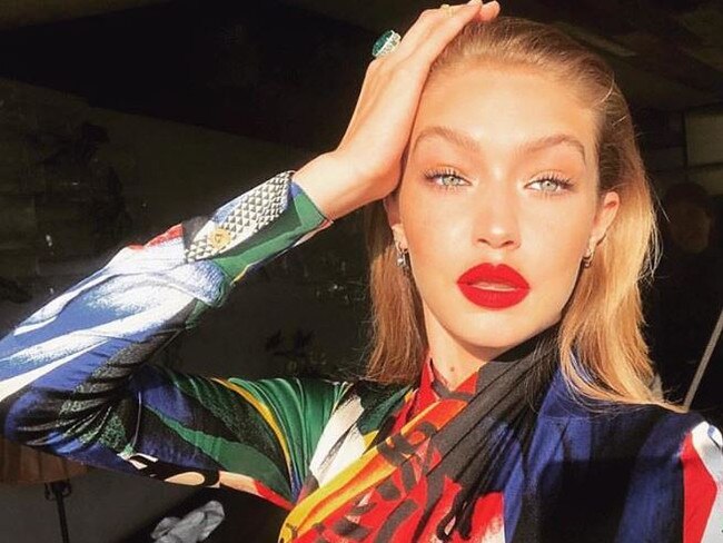 Model Gigi Hadid doing the "migraine pose" on Instagram.