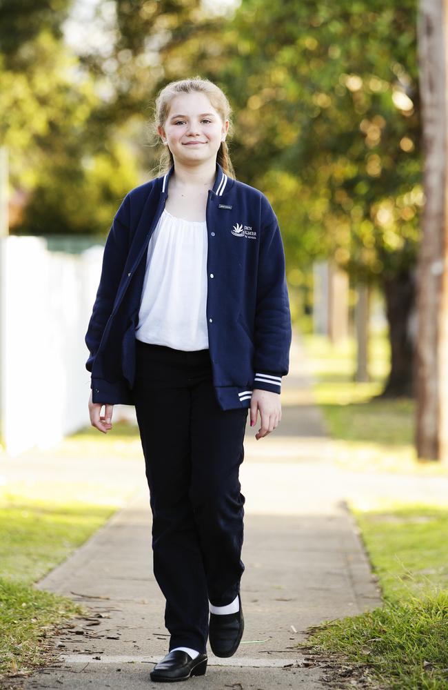 Claire Mibus, 11, has won the right to wear pants at her school. Picture: Justin Lloyd