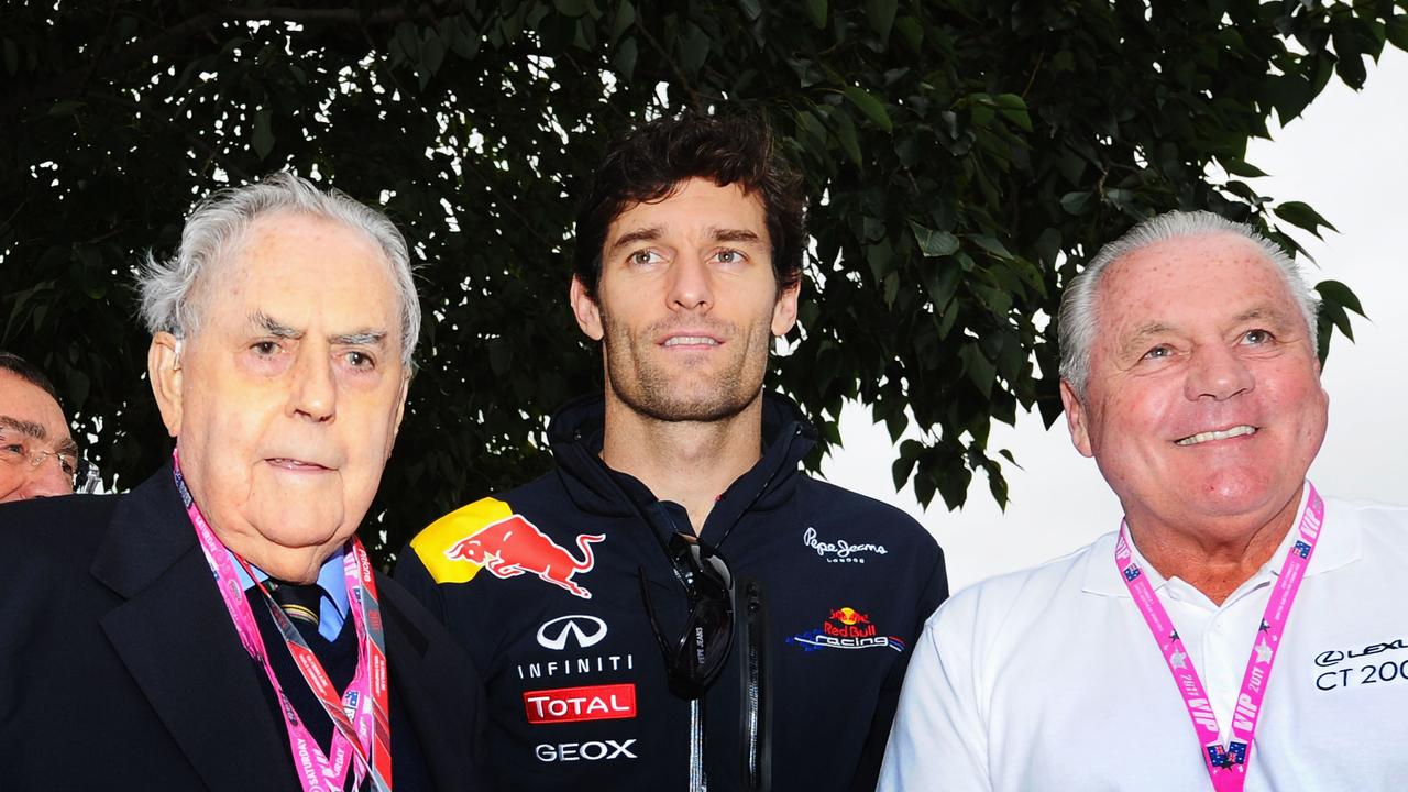 Jones is a constant figure around Grand Prix time. Pictured here with former Australian Red Bull driver Mark Webber (centre) and two-time World Champion Jack Brabham. (Photo by Clive Mason/Getty Images)