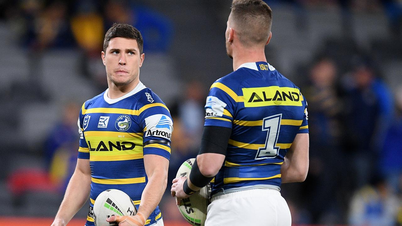 Mitchell Moses (left) and Clint Gutherson of the Eels warm up ahead of the Round 23 NRL match between the Parramatta Eels and the Canterbury-Bankstown Bulldogs at Bankwest Stadium in Sydney, Thursday, August 22, 2019. (AAP Image/Dan Himbrechts) NO ARCHIVING, EDITORIAL USE ONLY