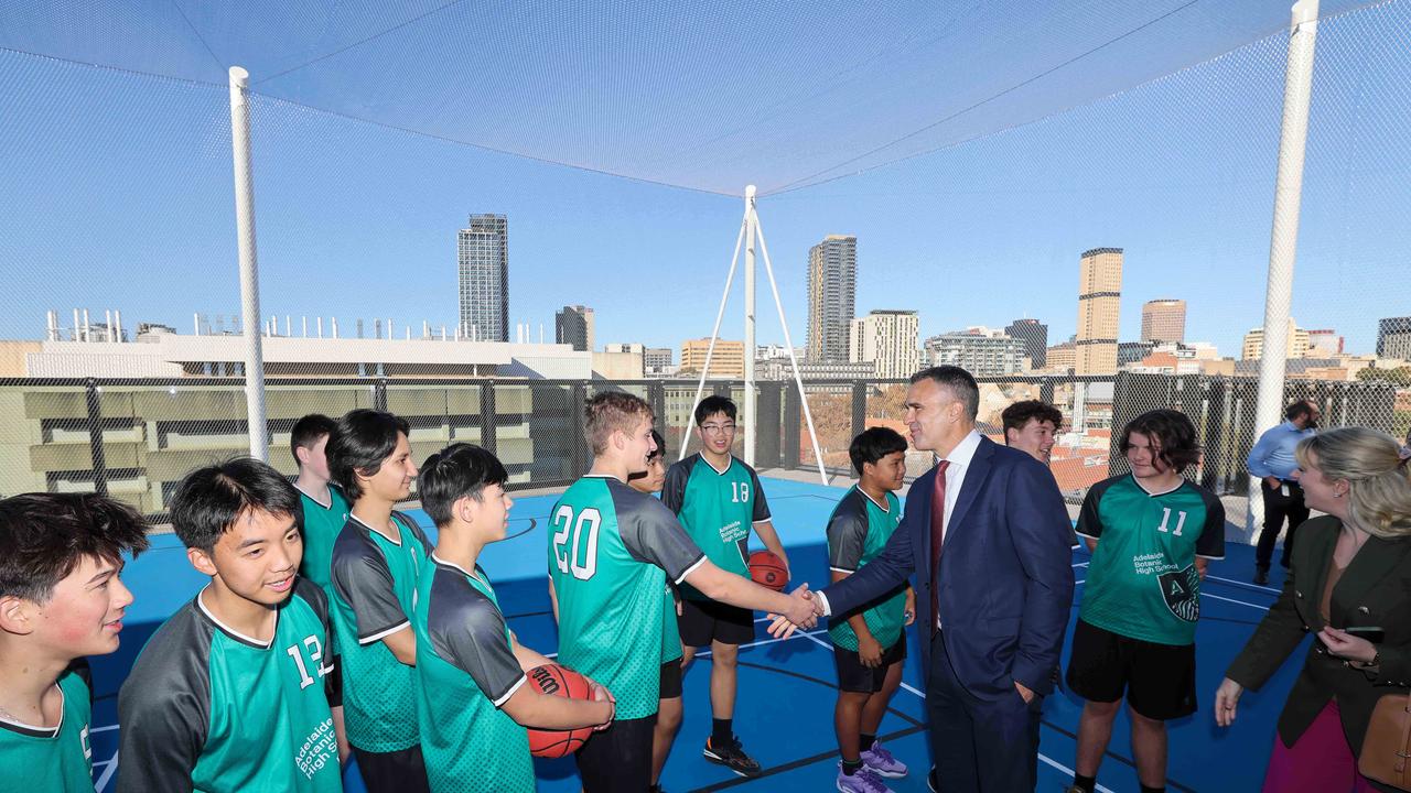 What a view! Premier Peter Malinauskas meets some Year 9 students on the new basketball court rooftop. Picture:Russell Millard