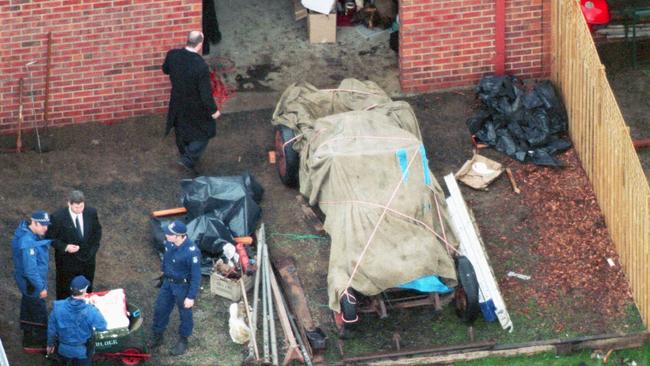 Police searching for evidence in Cranbourne as part of the murder investigation.