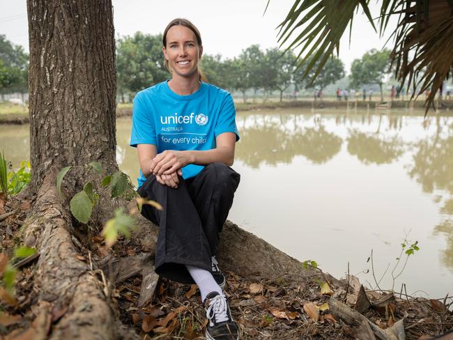 Olympian Emma McKeon, a UNICEF Australia ambassador, visits one the charity's SwimSafe programs in Sreepur, Gazipur Union, Gazipur, Bangladesh, where children are learning to swim in a bamboo structure in a muddy pond. Picture: Jason Edwards