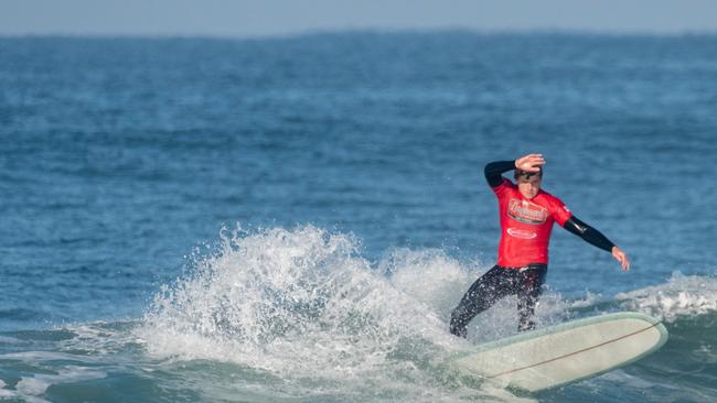 CARVING: Evans Head surfer Sam Ticknor's grace under pressure saw him emerge as the dominant surfer in the Men's Open Longboarding division at the Port Stephens Surf Festival on Thursday April 29, 2021 with a respectable two-wave total of 12.74. Photo: Ethan Smith / Surfing NSW