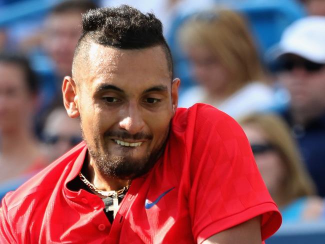 MASON, OH - AUGUST 20:  Nick Kyrgios of Australia Grigor returns a shot to Dimitrov of Bulgaria during the men's final during Day 9 of of the Western and Southern Open at the Linder Family Tennis Center on August 20, 2017 in Mason, Ohio.  (Photo by Rob Carr/Getty Images)