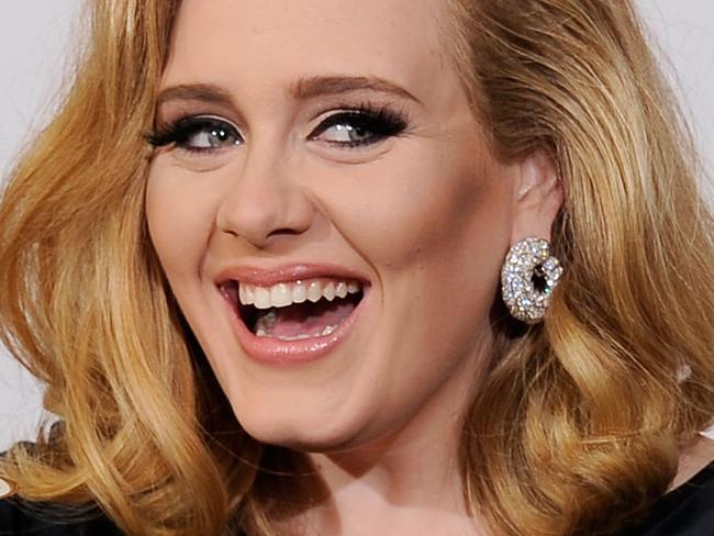 FILE - APRIL 19: Singer Adele and her husband Simon Konecki have ended their relationship after more than seven years together. LOS ANGELES, CA - FEBRUARY 12:  Singer Adele, winner of the GRAMMYs for Record of the Year for "Rolling In The Deep", Album of the Year for "21", Song of the Year for "Rolling In The Deep", Best Pop Solo Performance for "Someone Like You", Best Pop Vocal Album for "21" and Best Short Form Music Video for "Rolling In The Deep", poses in the press room at the 54th Annual GRAMMY Awards at Staples Center on February 12, 2012 in Los Angeles, California.  (Photo by Kevork Djansezian/Getty Images)