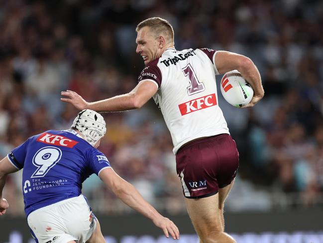 SYDNEY, AUSTRALIA - AUGUST 30:  Tom Trbojevic of the Sea Eagles makes a break during the round 26 NRL match between Canterbury Bulldogs and Manly Sea Eagles at Accor Stadium on August 30, 2024, in Sydney, Australia. (Photo by Cameron Spencer/Getty Images)