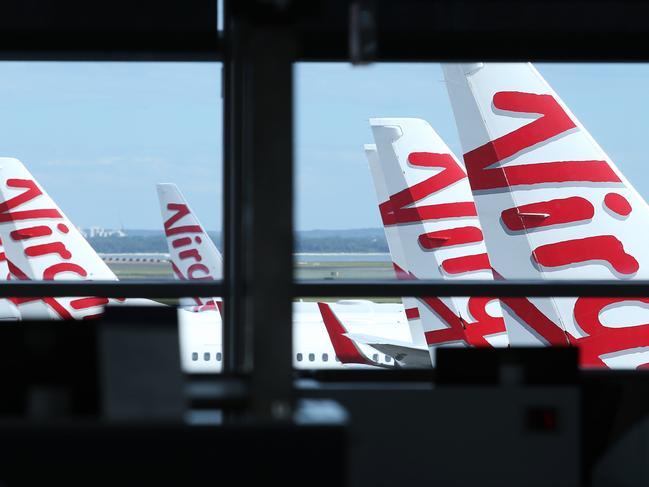 30/3/20: The Virgin Australia terminal at Sydney domestic terminal is deserted. John Feder/The Australian.