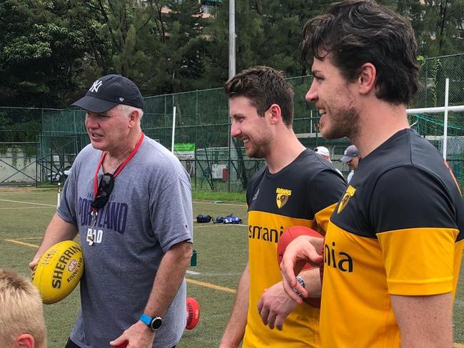 Danny Frawley at an AusKick coaching clinic in Hong Kong with Hawks players. Picture: Jeff Kennett