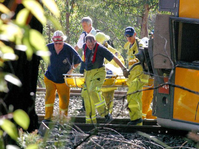 Rescuers help the survivors.