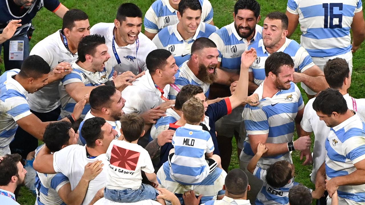 Argentina celebrate beating wales and making the World Cup semi-finals. (Photo by Sylvain THOMAS / AFP)