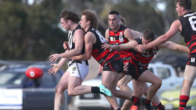 Callum Thompson (Glenorchy) is tackled by Zyhe Ackroyd (Lauderdale). Picture: Nikki Davis-Jones