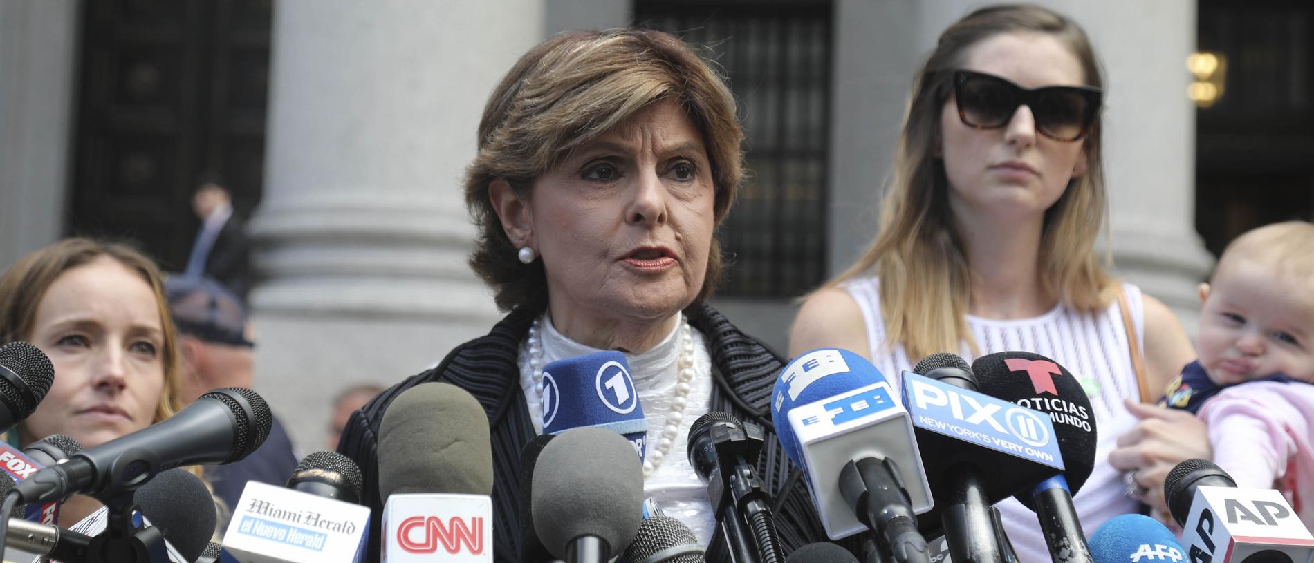 Lawyer Gloria Allred (centre) with two of her clients, speak during a news conference after leaving a Manhattan court on August 27, 2019. Picture: AP / Bebeto Matthews.